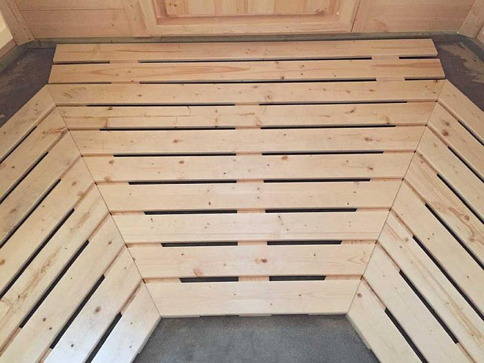 Wolff Finnhaus Grillkota Basic 9 mit Grillanlage schwarze Schindeln und rundem Tisch